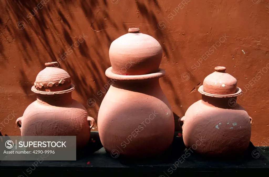 San Francisco baroque church and monastery, three rustic pots in the cloisters, Lima, Peru