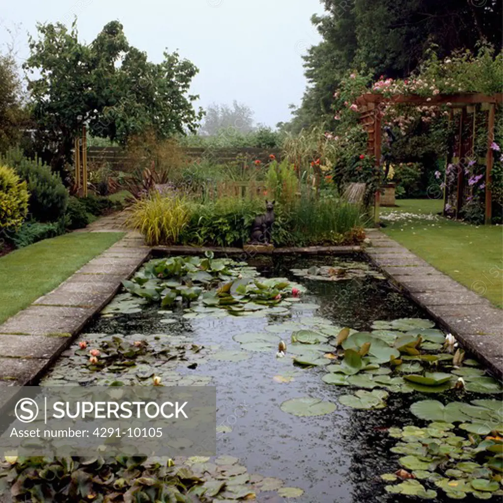 Rectangular pond in formal garden in summer