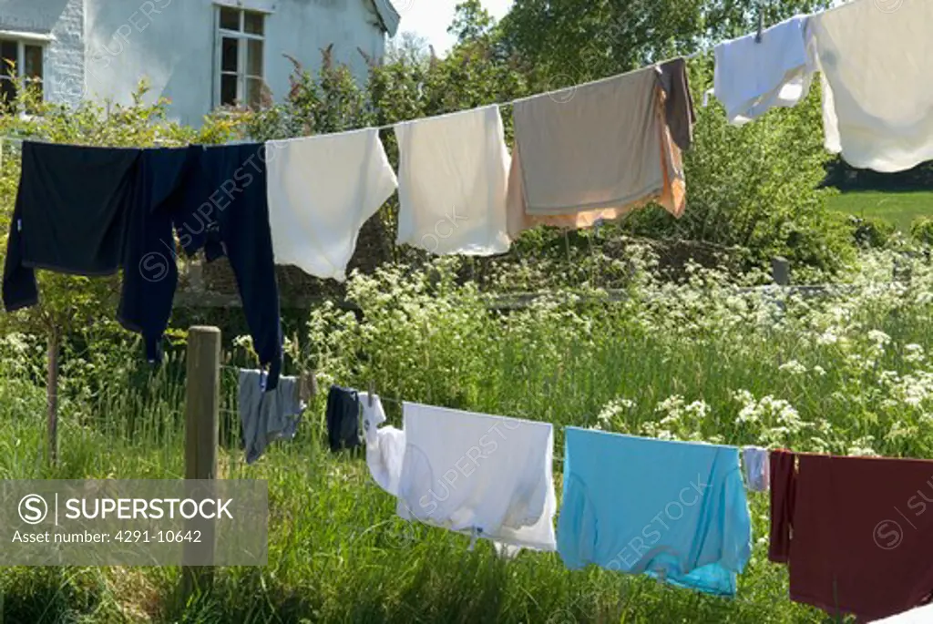 Washing in garden of country cottage