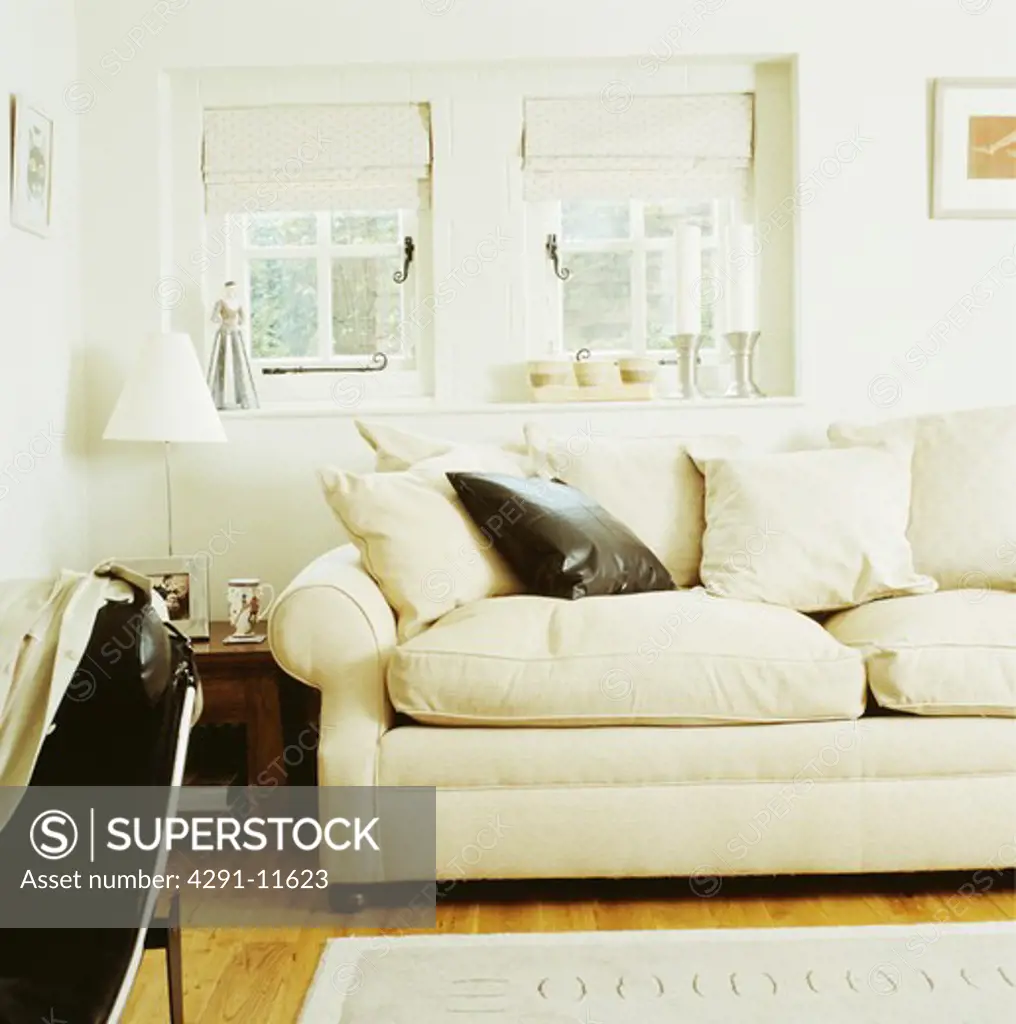 White sofa in white cottage living room