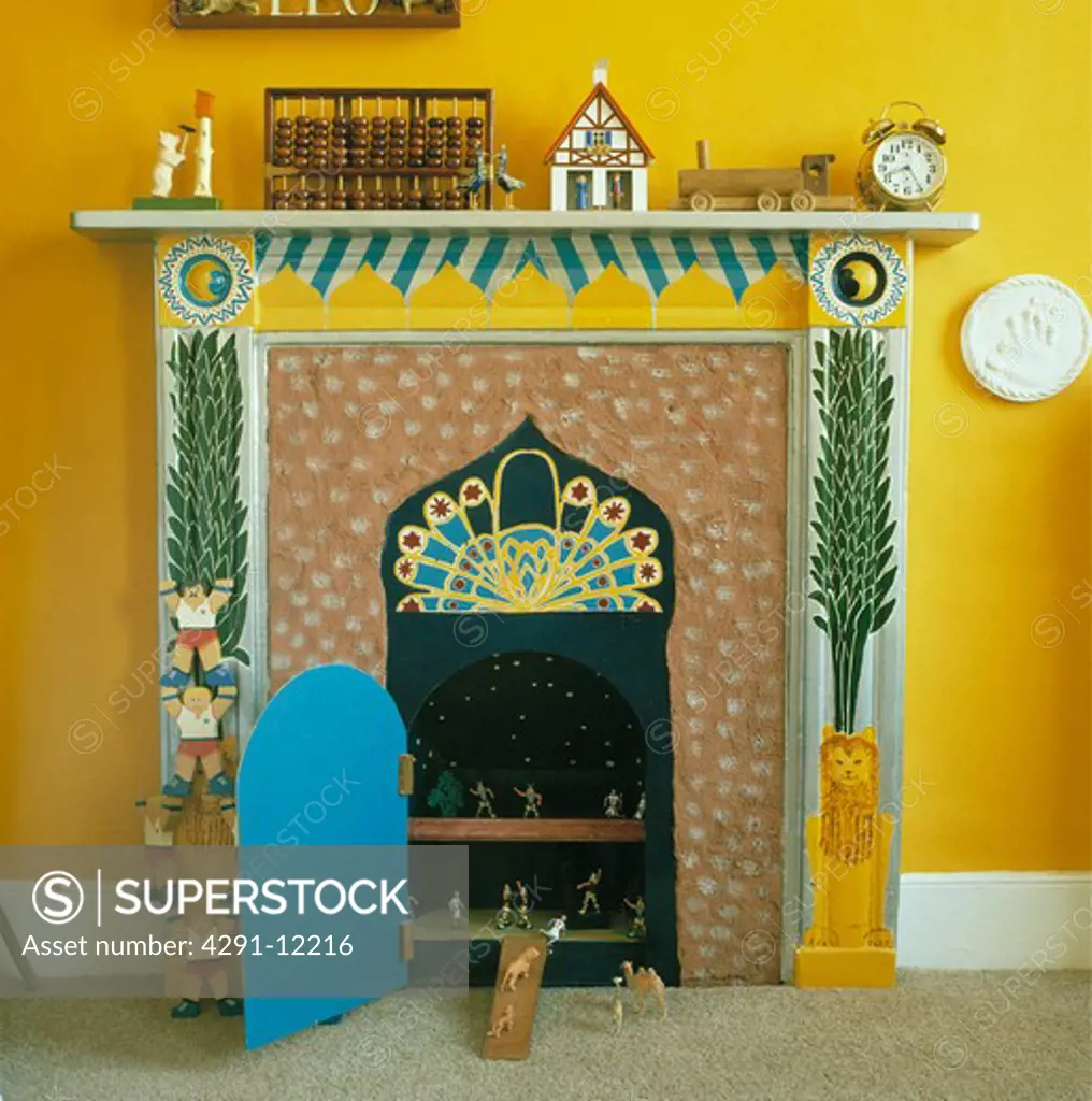 Close-up of painted fireplace with shelves in grate with open blue door