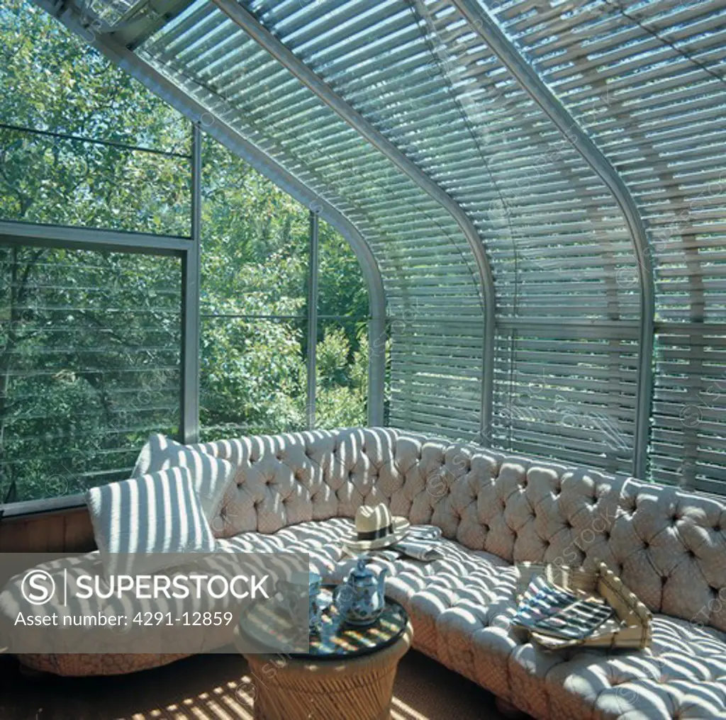 Glass metal conservatory built on top of extension