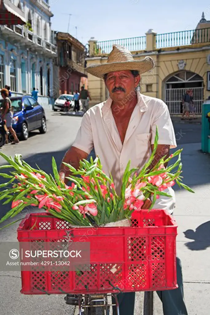 Traditional flower seller, Parque Cespedes, Santiago de Cuba, Cuba