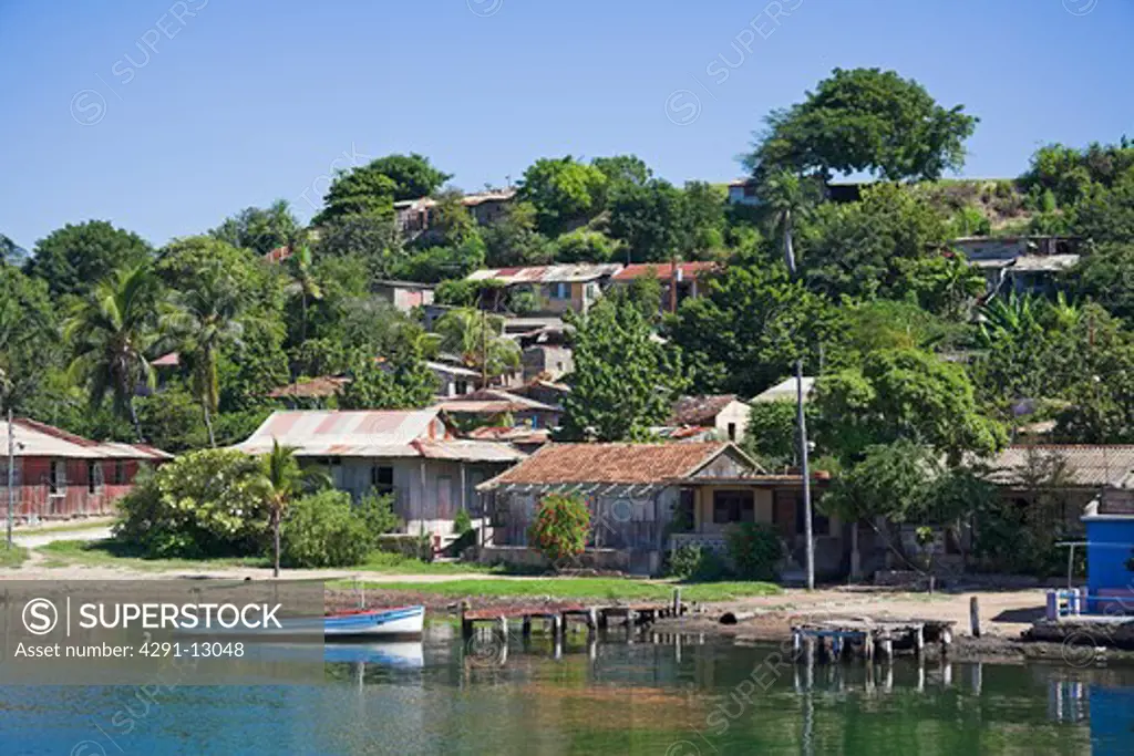 Houses on the shore of Cayo Granma, Santiago Bay, Santiago de Cuba, Cuba
