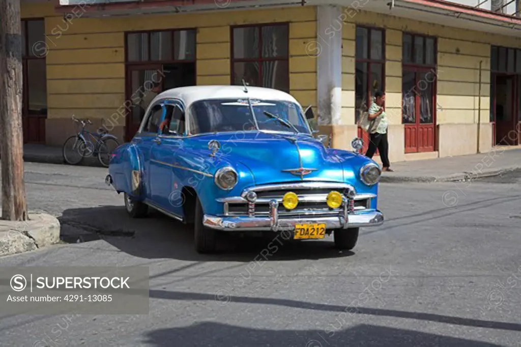 Classic American Chevrolet car in the road, Cienfuegos, Cienfuegos Province, Cuba