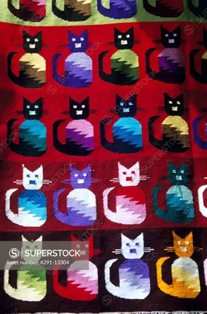 Carpet depicting cats hanging outside shop, Indian Market, Lima, Peru
