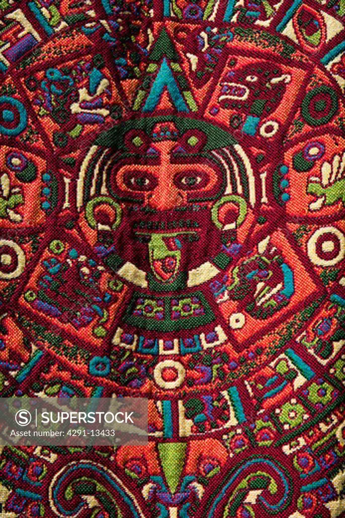 Close up of colourful embroidered Mexican tablecloth