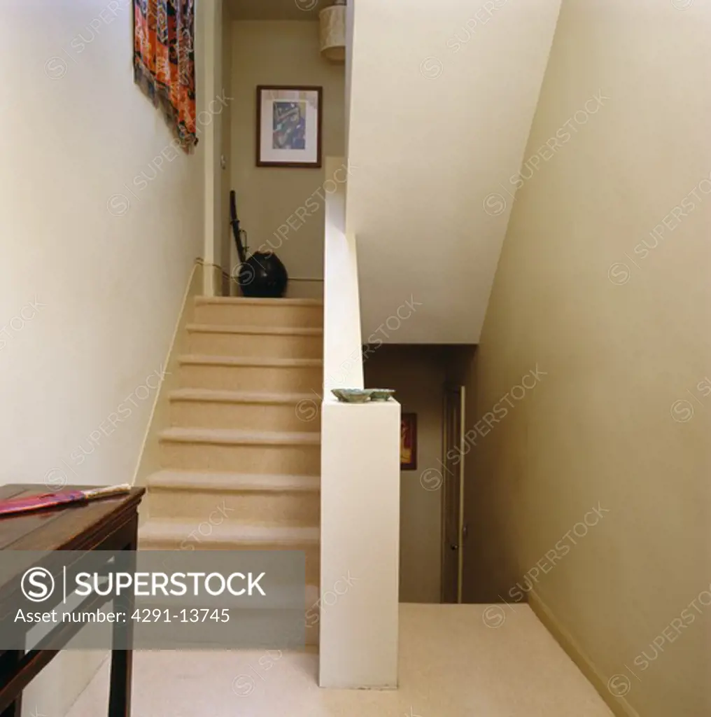 Cream carpet on staircase on modern landing
