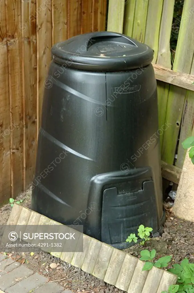 Close-up of black plastic compost bin