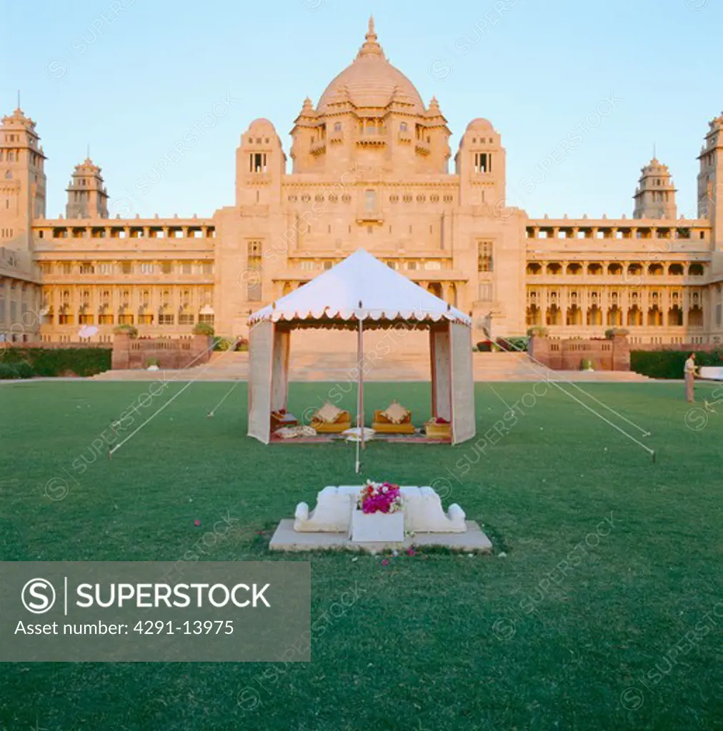 Small traditional Rajastani tent on lawn in front of the Palace of Jodhpur