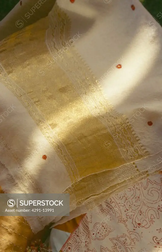 Close-up of gold-embroidered Rajastani shawls