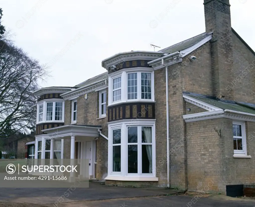 Detached Victorian country house with bay windows