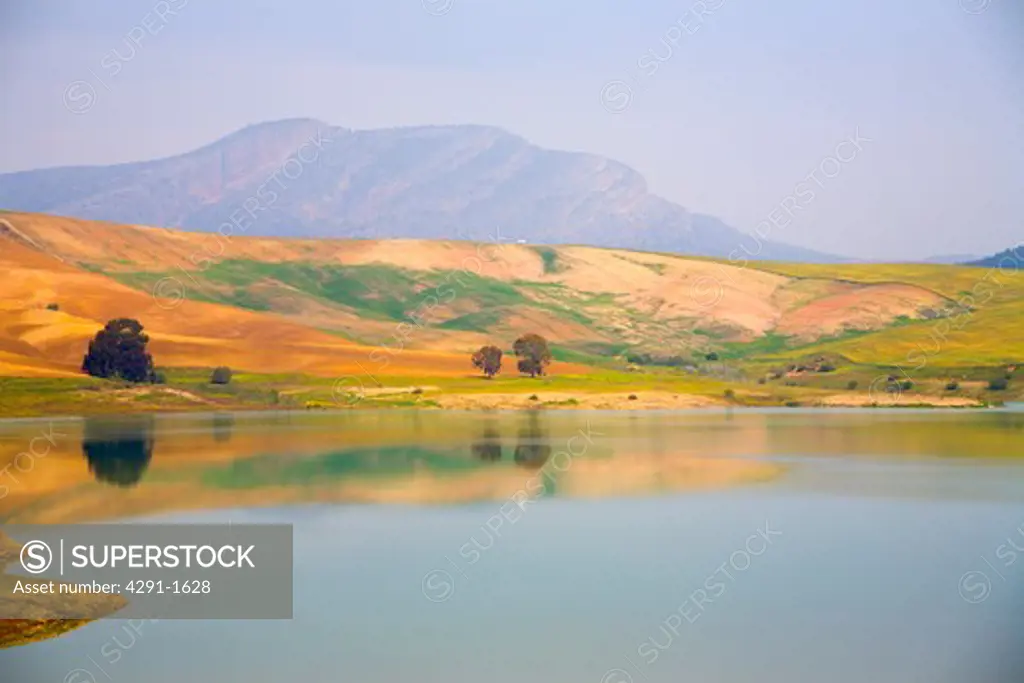 Manmade lake with mountains in the background in southern Spain