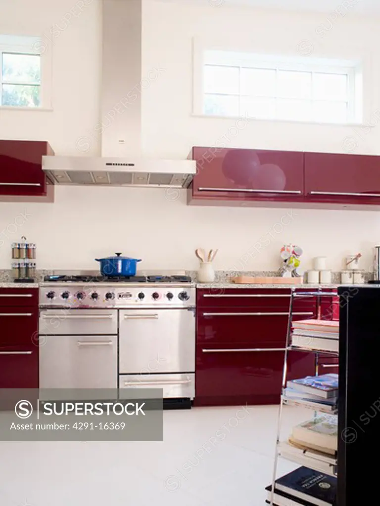 Stainless steel range oven inmodern kitchen with white flooring