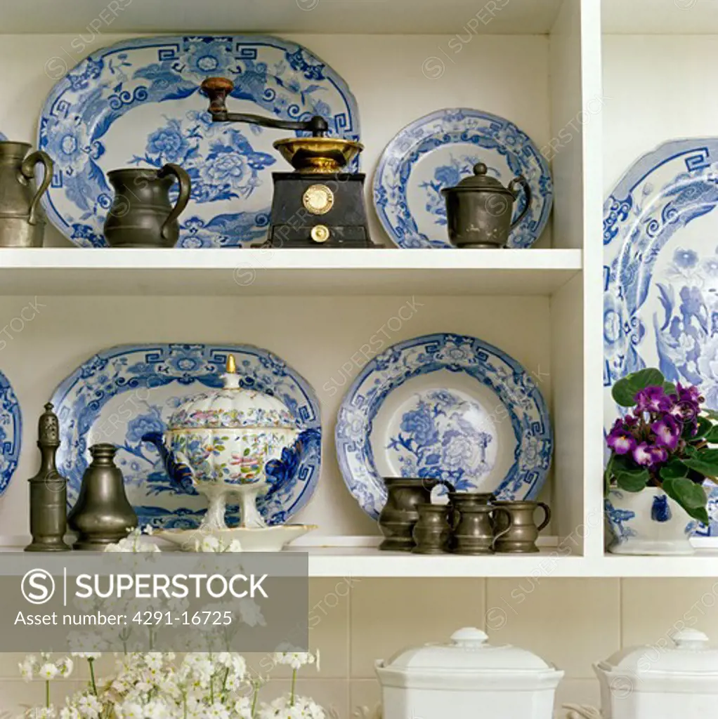 Close-up of collection of antique blue and white china
