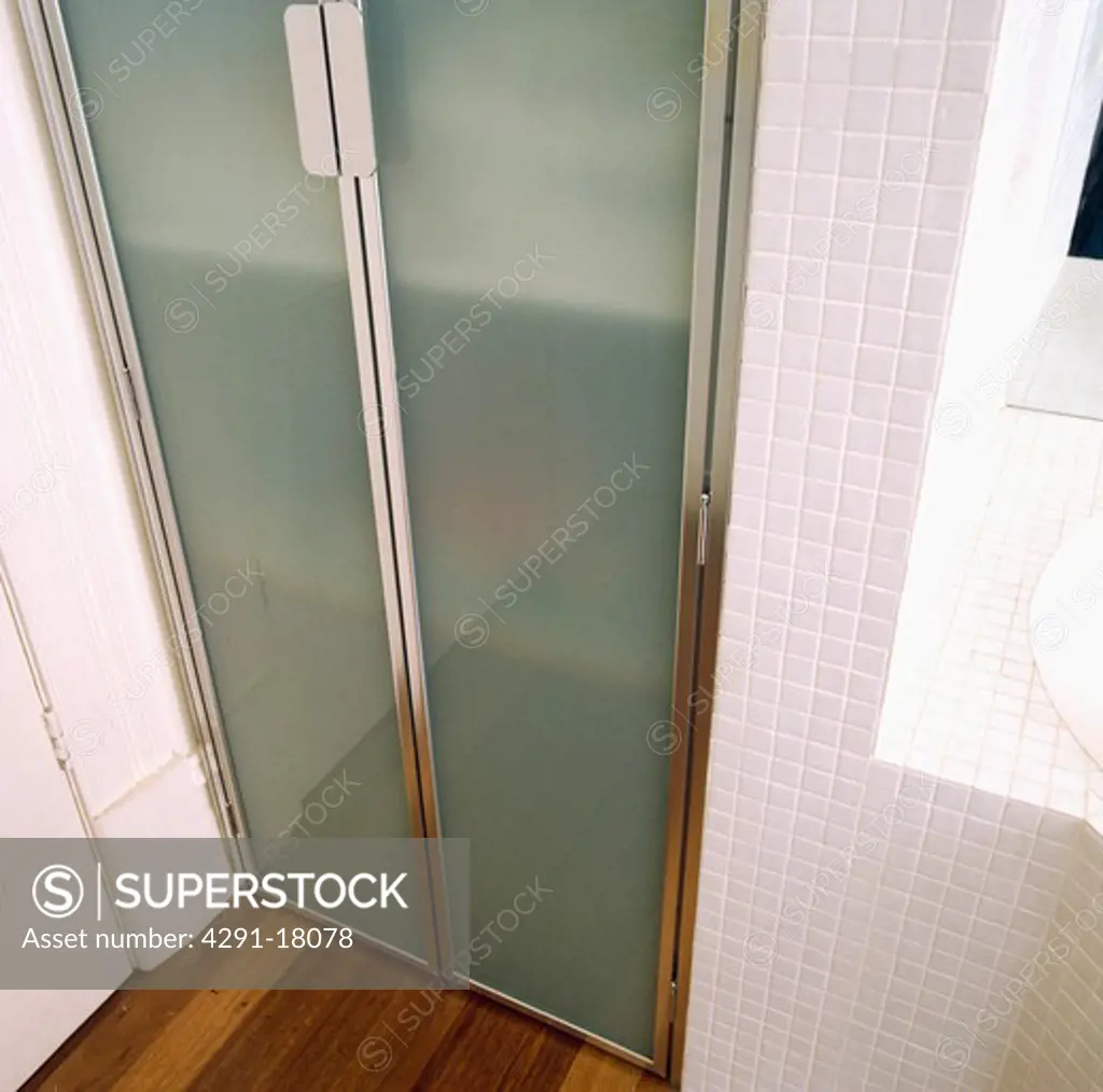 Close-up of opaque glass shower doors