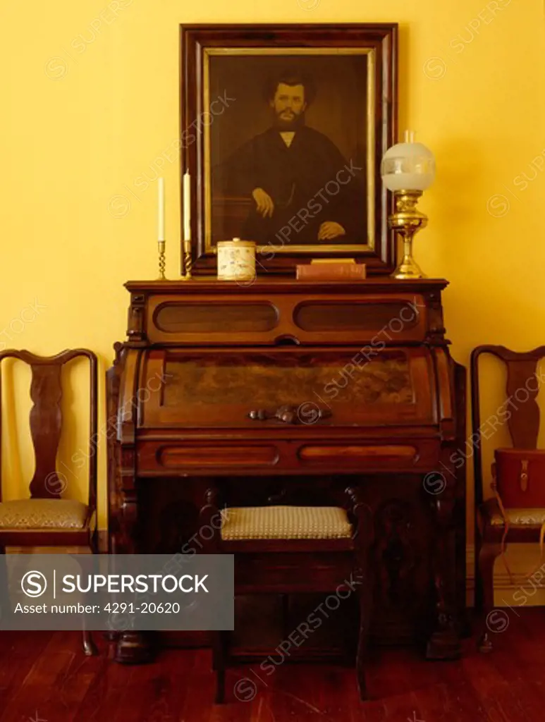 Oil portrait above old organ