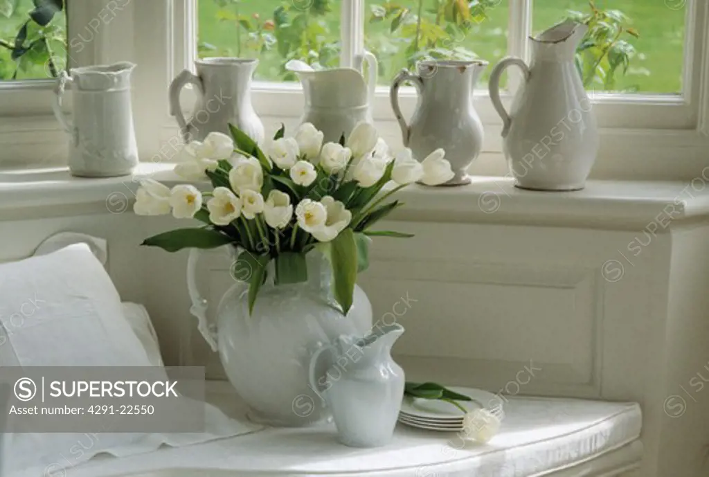 Still-Life of white tulips and jugs