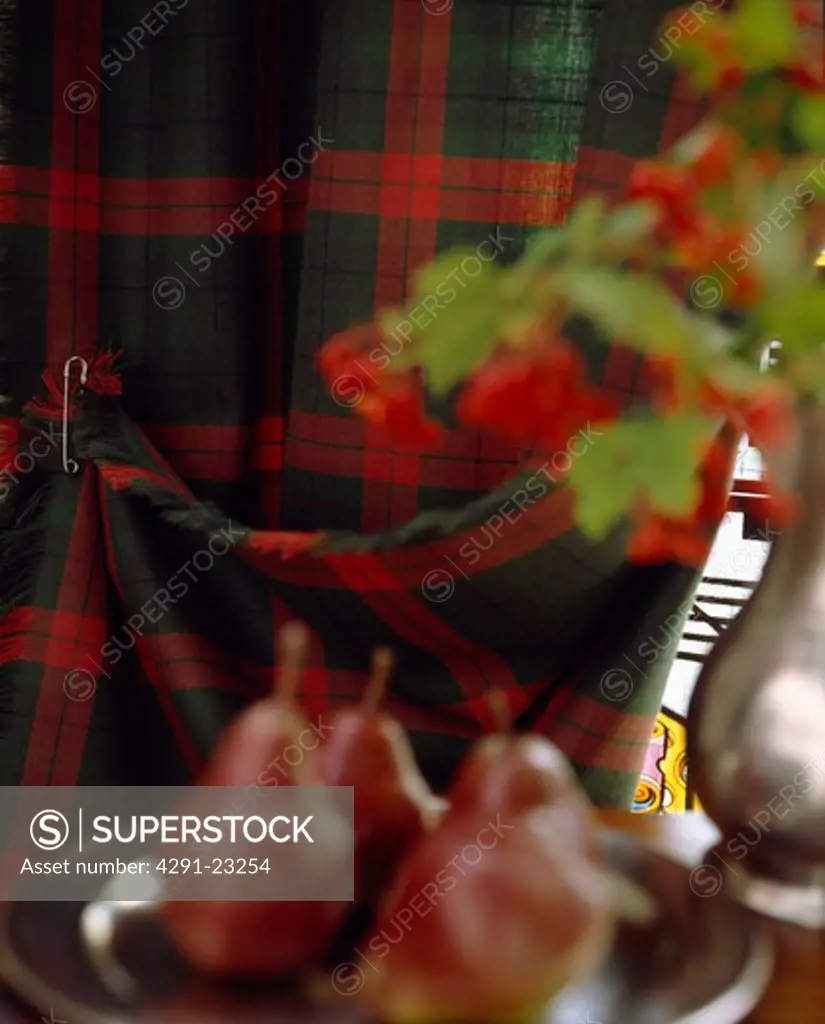 Candied pears against tartan background
