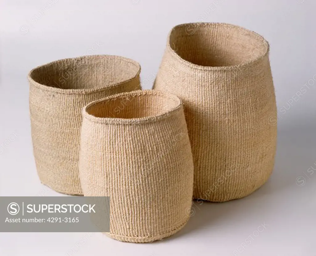 Close-up of three sisal storage baskets