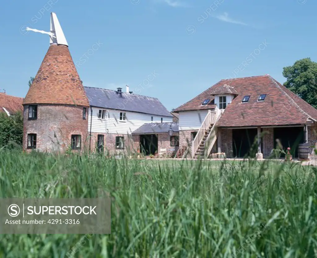 Outbuildings and traditional converted oast house in Kent