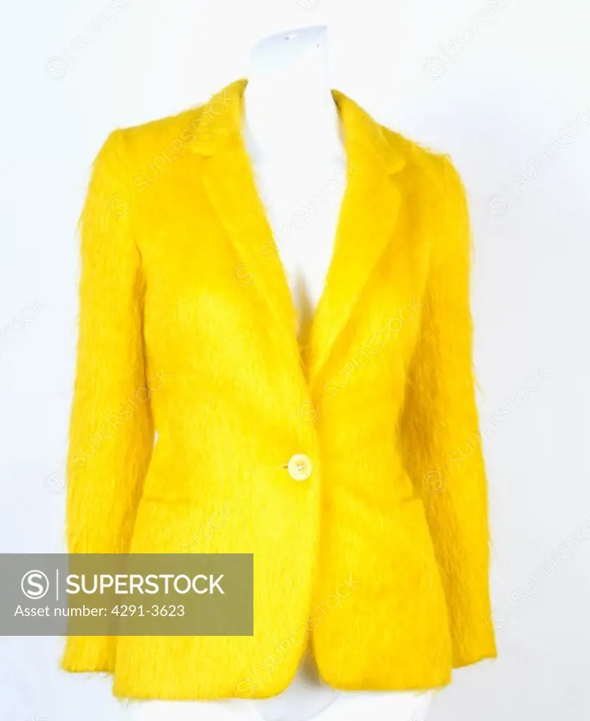 Close-up of bright yellow mohair jacket