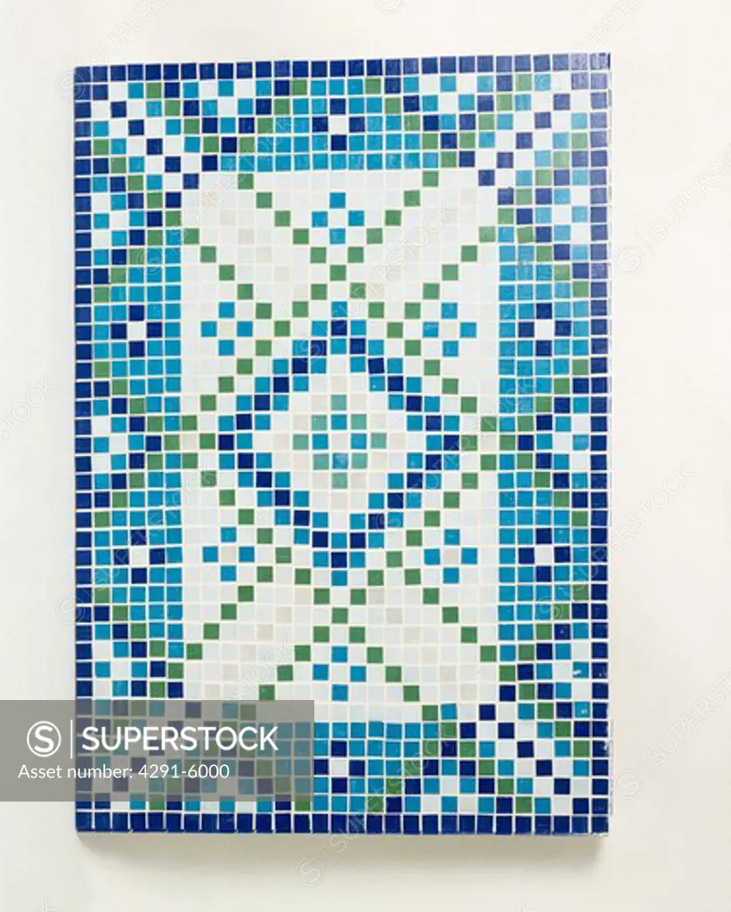 Close-up of blue and white mosaic tiled table top