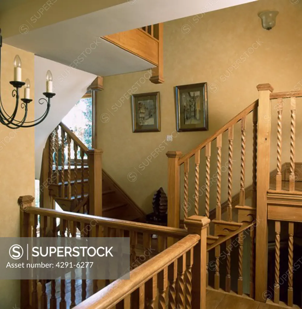 barleytwist wooden bannisters on staircase on neutral landing