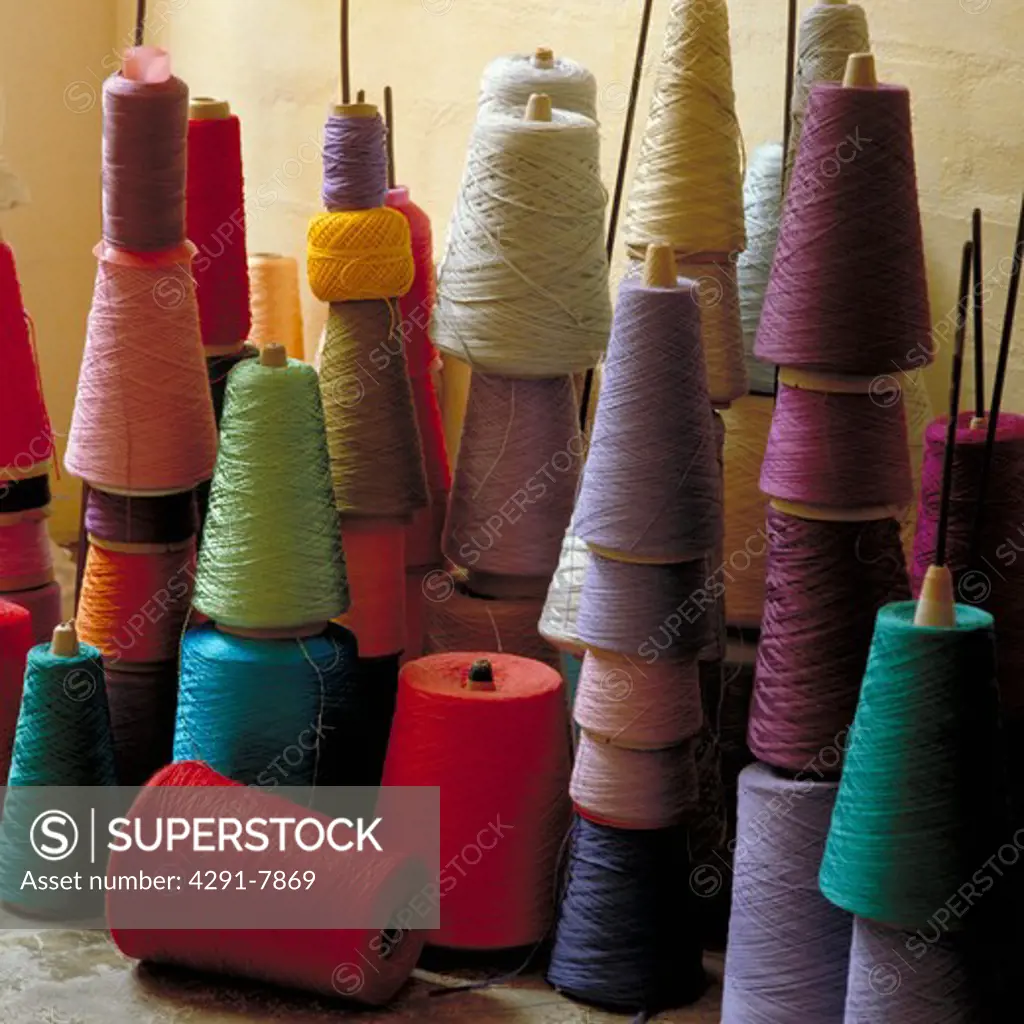 Close-up of multi-coloured silk and cotton reels