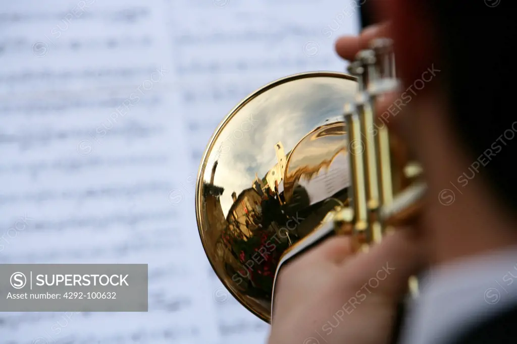 Detail of a musician playing trumpet