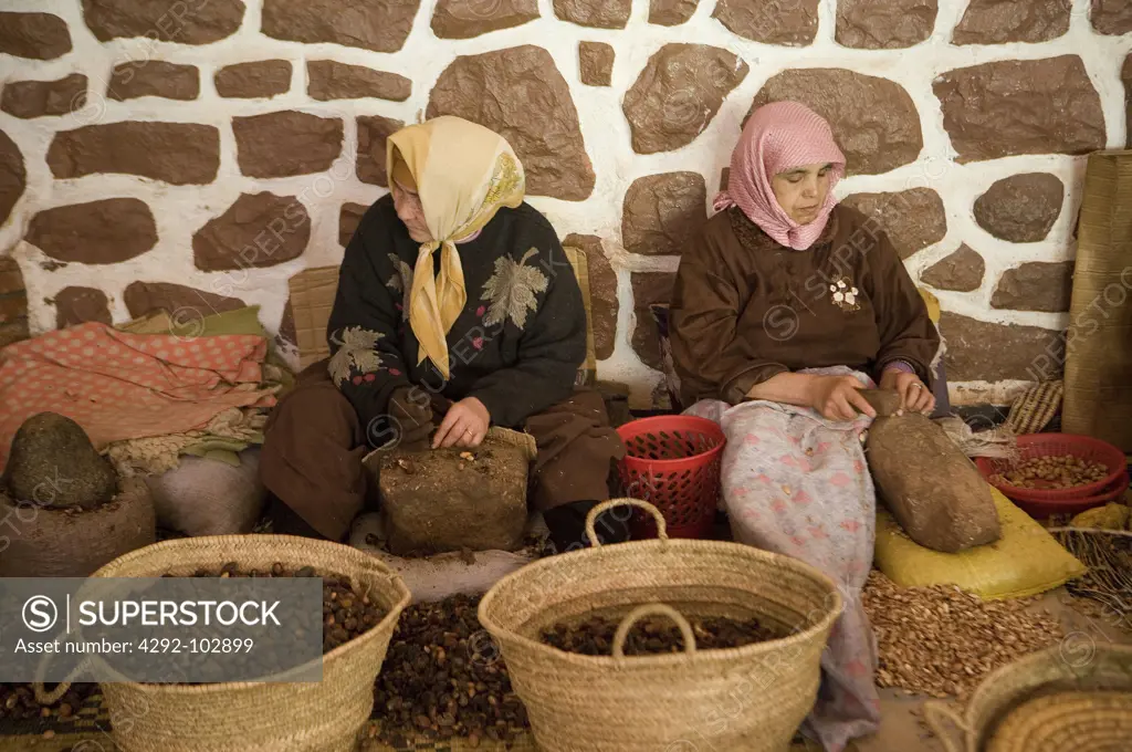 Morocco, Ourika valley, Women, Argan Oil Coorporative, Working.
