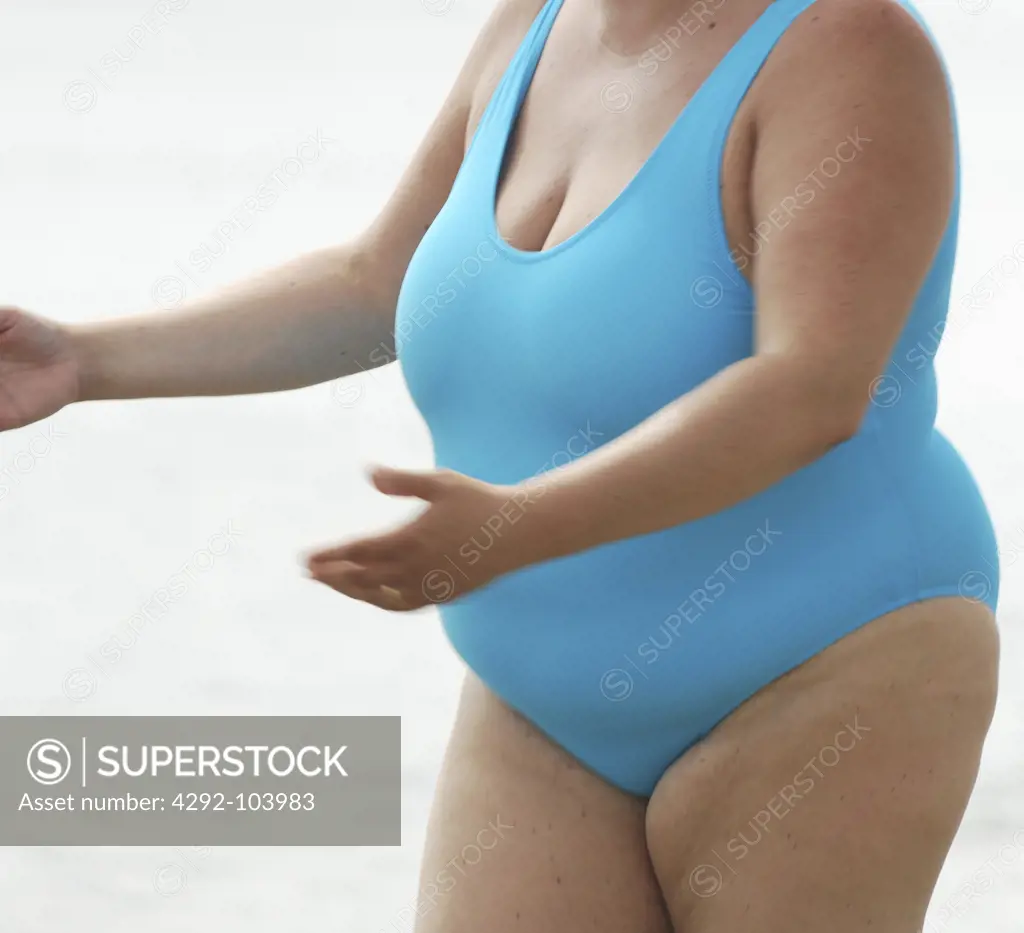 Overweight woman in swimsuit