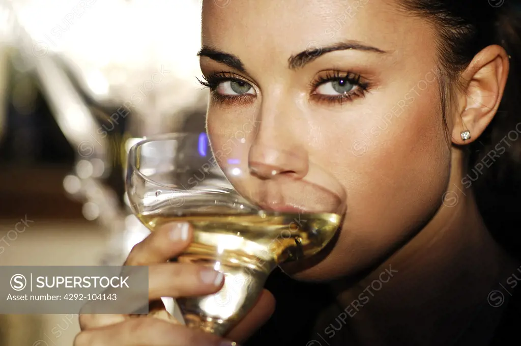 Woman drinking champagne
