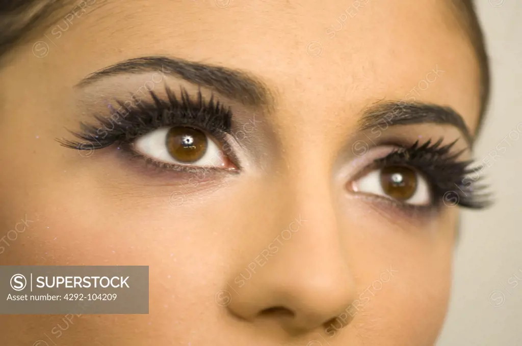 Close up of woman's eye wearing false eyelashes