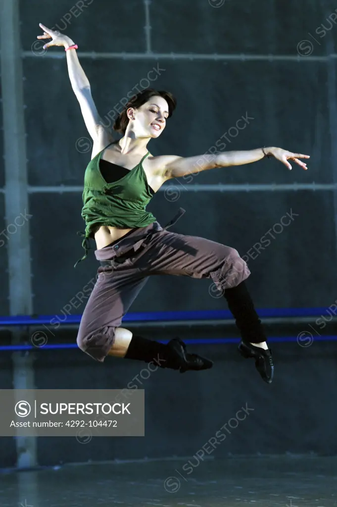 Female dancer training in dance studio