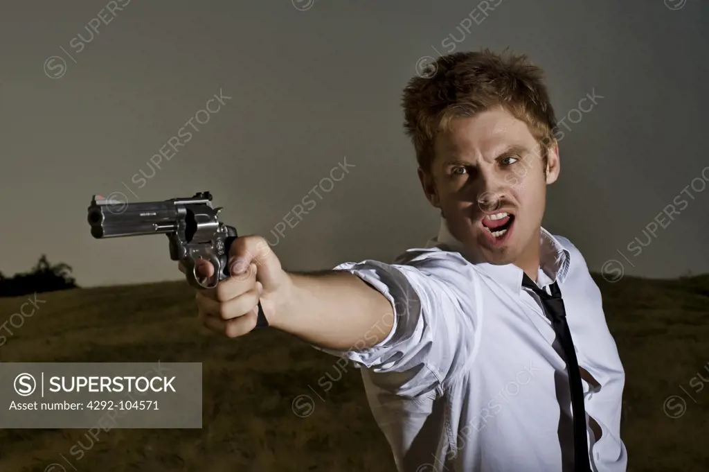Man pointing revolver