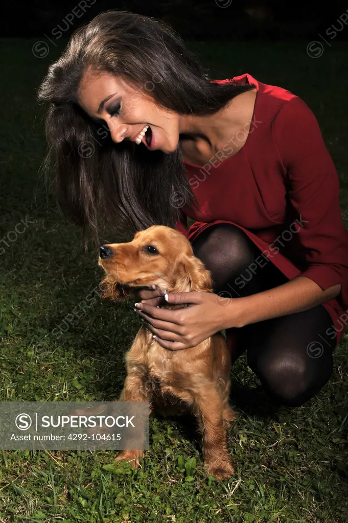 Young woman with English Spaniel