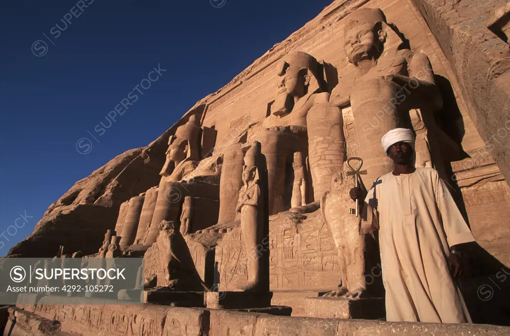 Egypt - Abu Simbel, Great Temple of Rameses II, one of the four statues of Ramesses II at the temple's gate