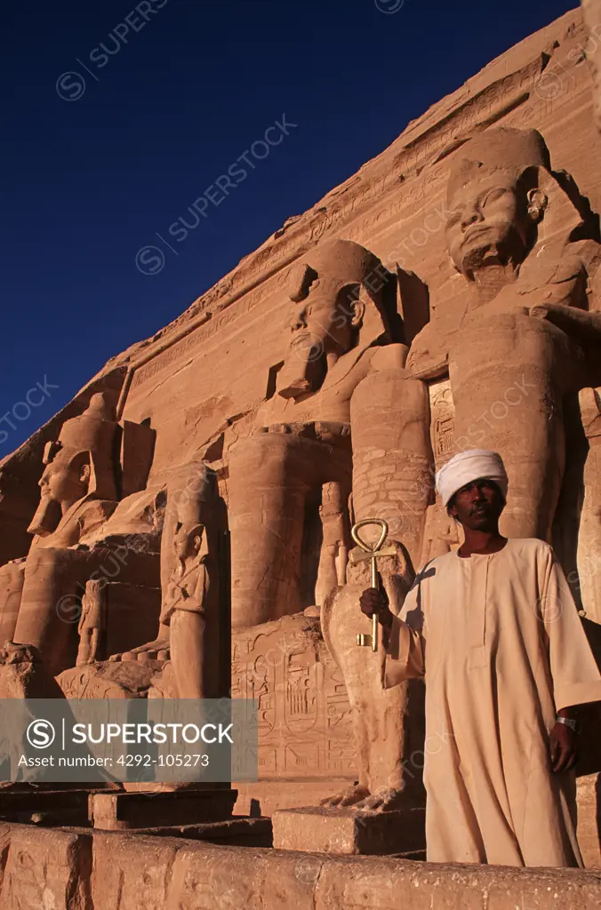 Egypt - Abu Simbel, Great Temple of Rameses II, one of the four statues of Ramesses II at the temple's gate