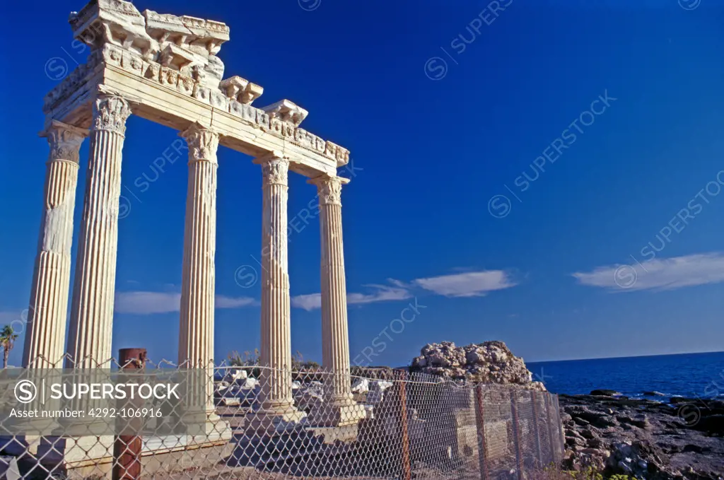 Apollon's Gate amongs the Roman ruins in Side beach, Antalya, Turkey