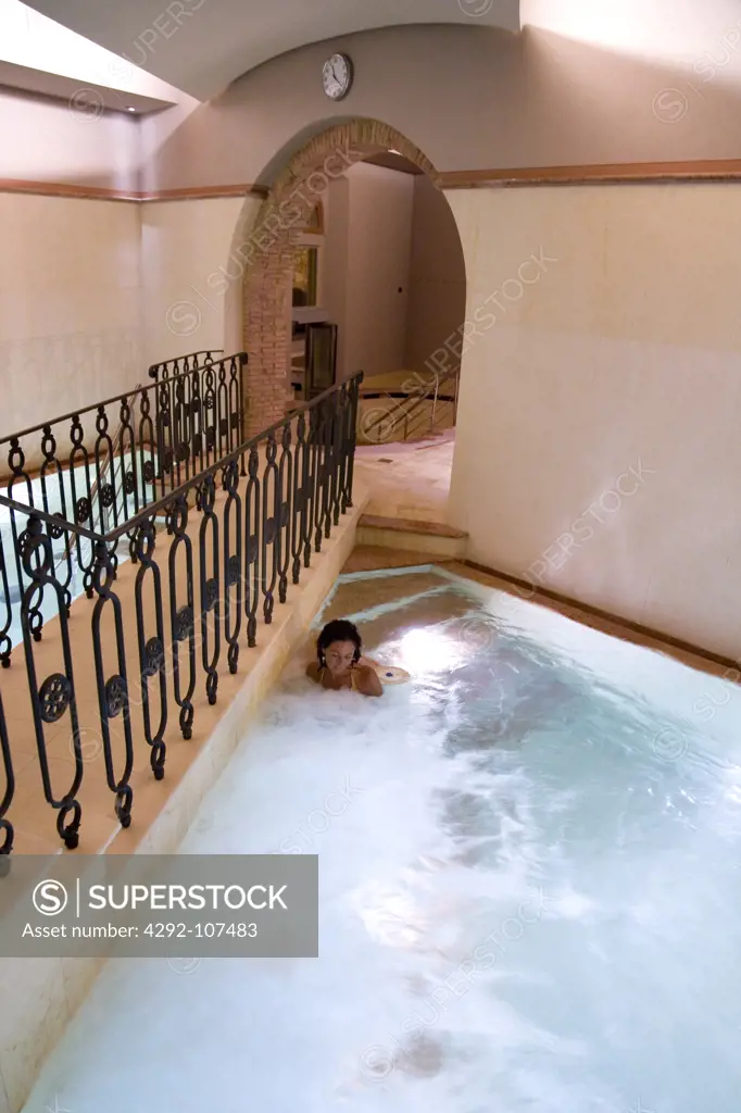 Woman in thermal pool