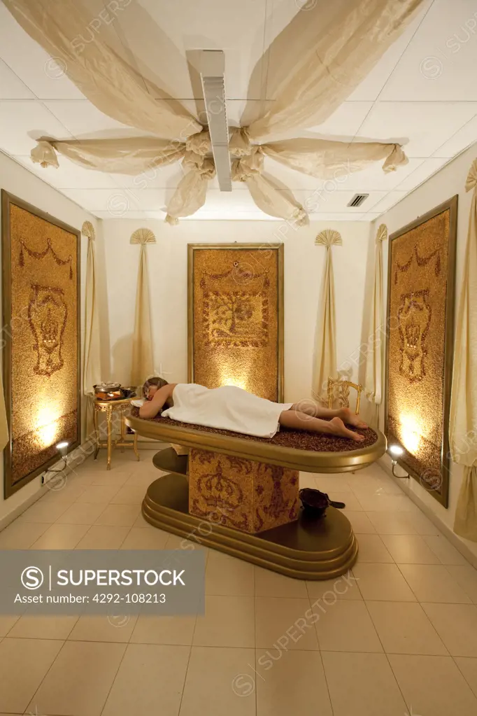 Italy, Liguria, Pigna Thermal baths,woman lying on massage table