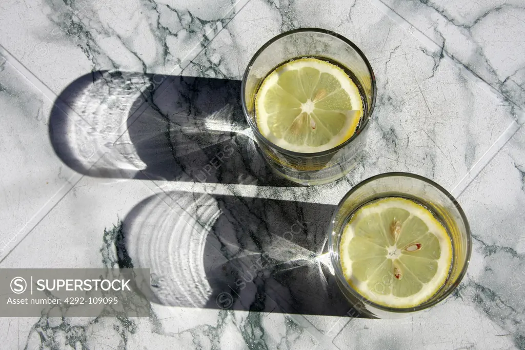 Two glasses of water with lemon slice