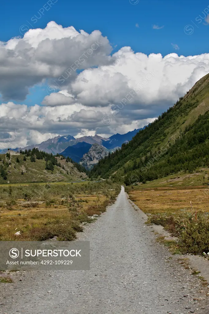 Italy, Alps, view of the Mont Blanc chain, dirt road
