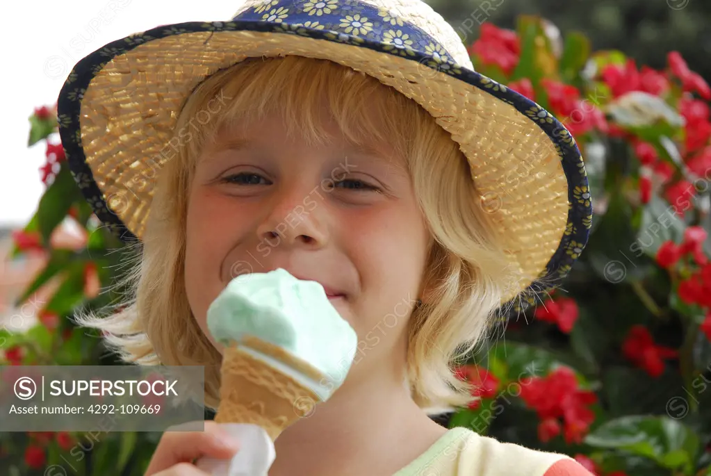 Portrait of a girl eating an ice cream