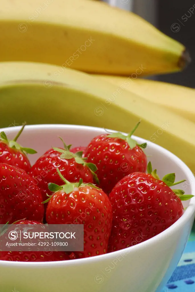 Bowl of Strawberries and bananas