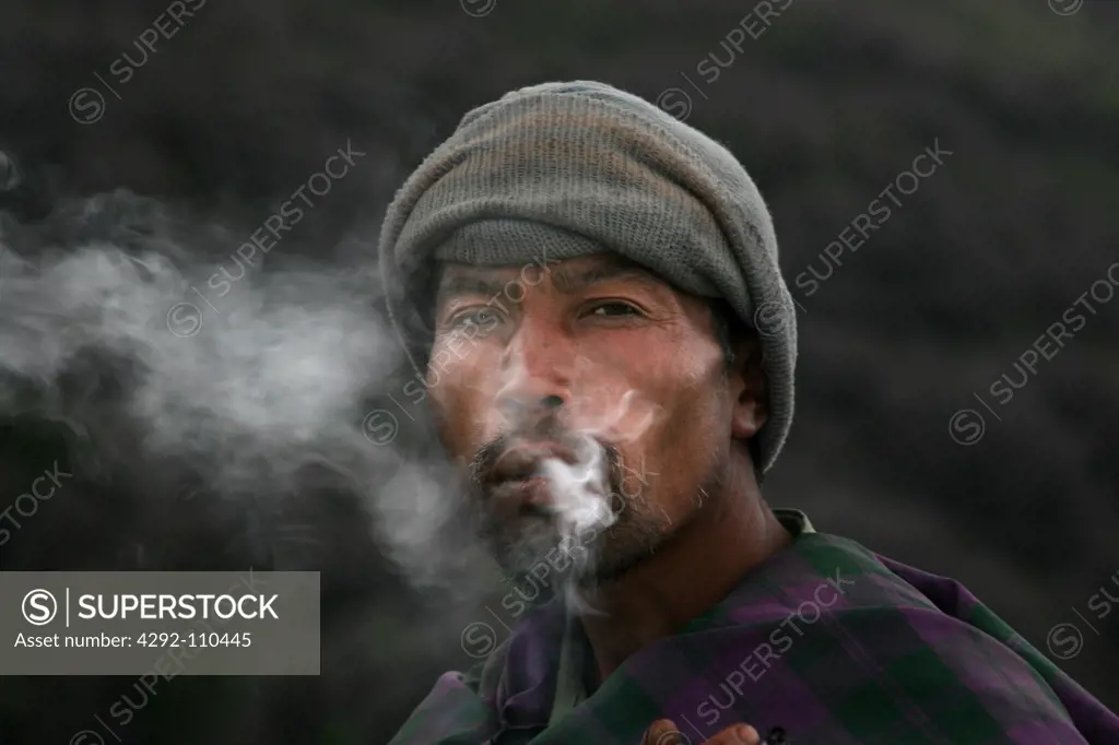 Indonesia, Java, man smoking