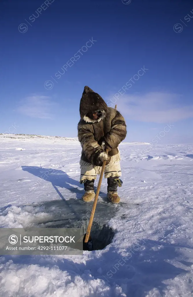Inuit fishing, Baker Lake Nunavut, Canada