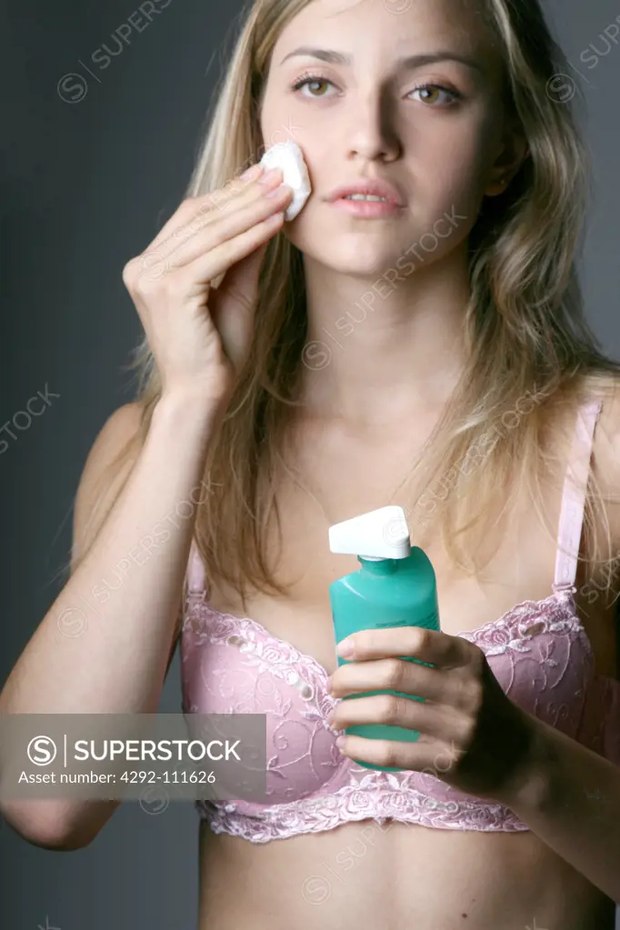 Woman with disinfectant