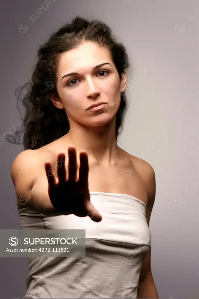 Woman showing a stop gesture